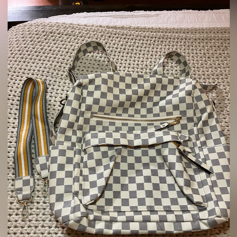Grey and white checkered backpack